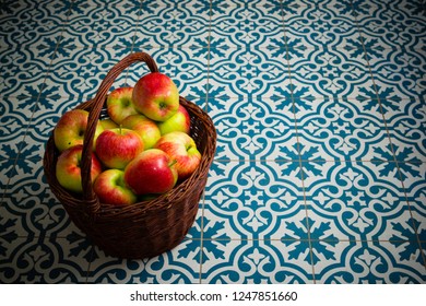 Basket Of Apple On Kitchen Tile Floor, Vignette Frame