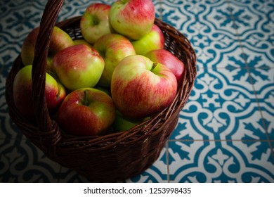 Basket Of Apple On Kitchen Tile Floor, Vignette Frame