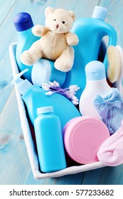 Basket Of Baby Supplies On Blue Background - Baby Time