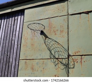 Basket ball hoop on rustic barn doors