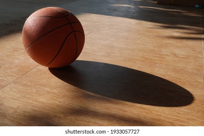           basket ball on the floor in morning                   