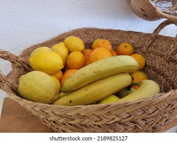 A Basket Case With Fruits: Banana, Orange, Lemon