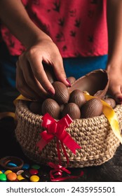 basket of chocolate Easter eggs, large and small with sprinkles