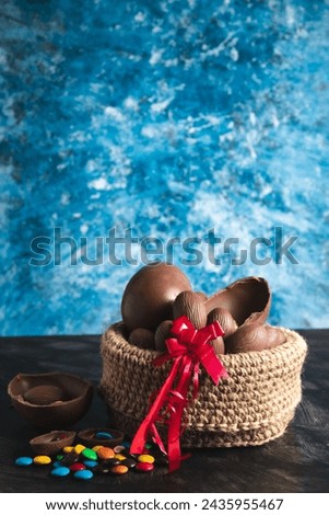 basket of chocolate Easter eggs, large and small with sprinkles