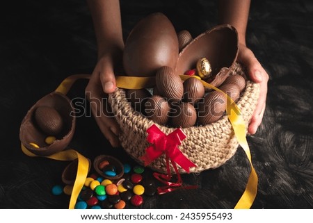 basket of chocolate Easter eggs, large and small with sprinkles