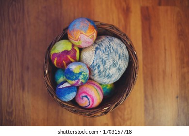 Basket with colored wool balls, Waldorf pedagogy.
