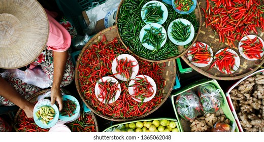 Basket of dried chili pepper sold in asian market - Powered by Shutterstock