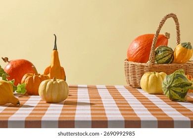Basket filled with pumpkins with different shape and color on checkered cloth background. Thanksgiving promotions, and rustic product mockups.