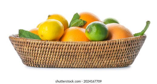 Basket with fresh citrus fruits on white background - Powered by Shutterstock