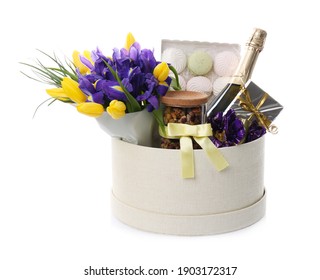 Basket with gifts, bouquet and champagne on white background - Shutterstock ID 1903172317