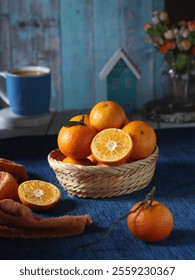 A basket of oranges on the table with complementary colors photography concept 