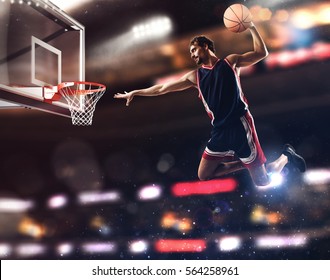Basket Player Throws The Ball At The Stadium
