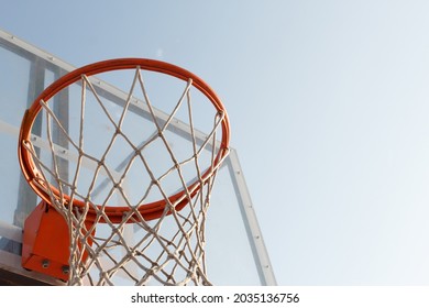 Basket for playing basketball on a blue sky background