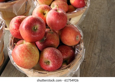 Basket Of Red Apples At A Farm Stand.