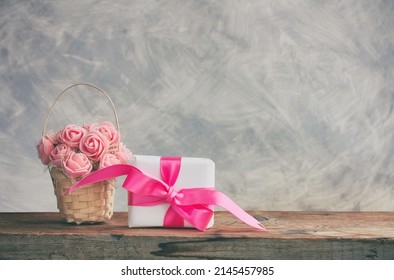 Basket With Roses, Gift Box With Pink Bow, Mother's Day Concept, Congratulation Postcard