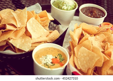 Basket Of Tortilla Chips, Queso, Guacamole And Salsa, Vintage Toned