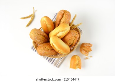 basket of various bread rolls and buns on white background - Powered by Shutterstock