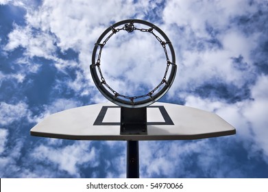 basketball backboard under the clouds.