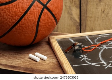 Basketball ball with chalkboard strategy planning close up - Powered by Shutterstock