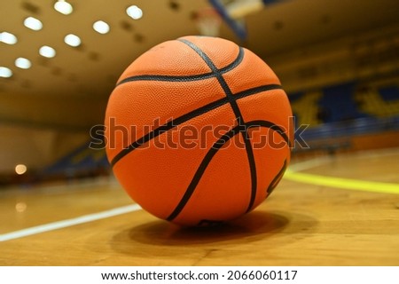 Basketball ball on the court in sport arena