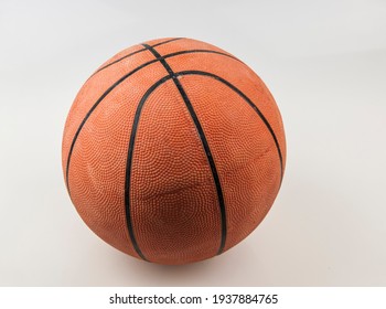 Basketball ball over white background. Orange ball, sports concept. 