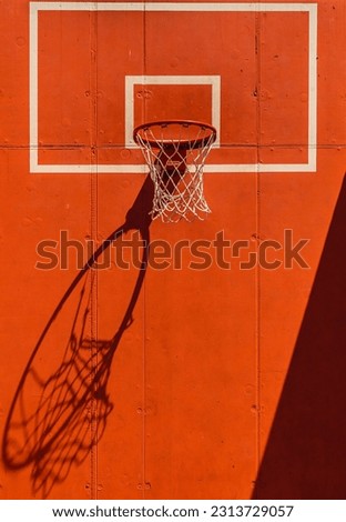Basketball. Basket. Orange. White lines. Reflection.