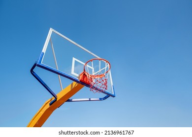 A basketball box under the blue sky