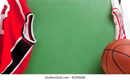 A Basketball Coach's Blank Green Chalkboard With A Basketball And Jerseys