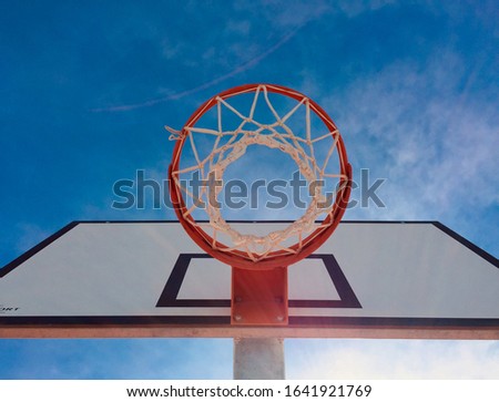 Basketball court in the desert under clear blue sky