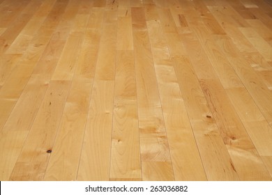 A Basketball Court Floor Made Of Maple Hardwood Viewed At A Low Angle