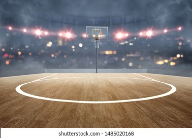 Basketball court with wooden floor and spotlights over blurred lights background