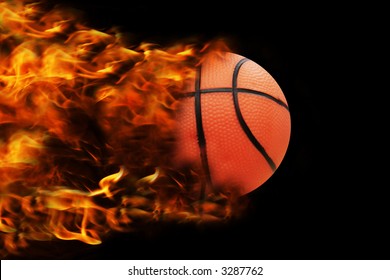 basketball in full speed, fire behind