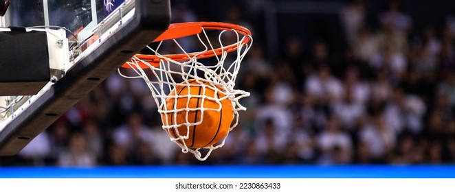 basketball game ball in hoop - Shutterstock ID 2230863433