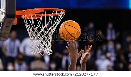 basketball game focus on ball