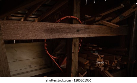 A basketball hoop in a barn