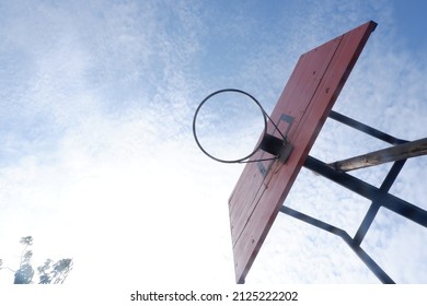 Basketball hoop. In Indonesia, basketball hoops do not use nets. This image is suitable for sports theme images.
