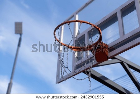 Basketball hoop on a blue sky