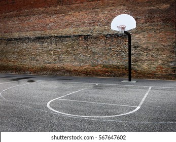 Basketball hoop in urban setting downtown city hood - Powered by Shutterstock