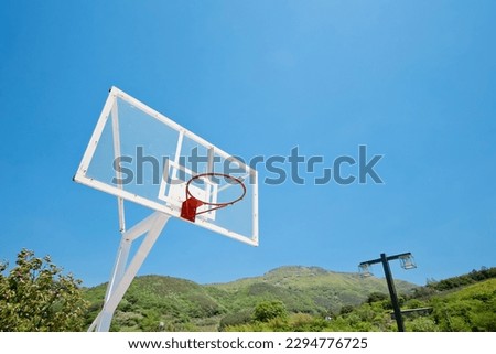 A basketball hoop without nets where black NBA players without money practiced as children