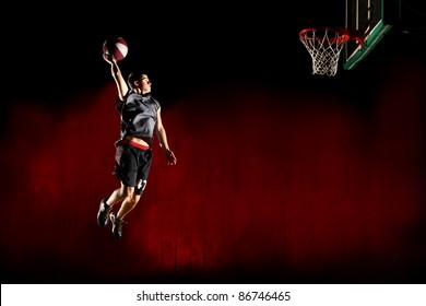 Basketball Jump Isolated On Black Red Background