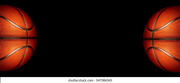 Basketball on a black background. panoramic or with blank space