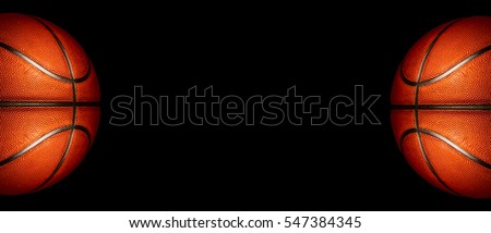 Basketball on a black background. panoramic or with blank space
