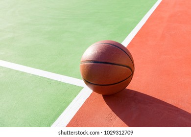 basketball on an outdoor playing field in a day time close up