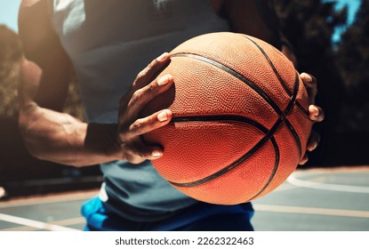 Basketball, basketball player and athlete hands closeup holding ball on basketball court in urban city park outside. African man, sports fitness and healthy lifestyle wellness training outdoors - Shutterstock ID 2262322463