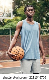 Basketball Player, Black Man Portrait And Outdoor Sports Court Training, Workout And Game In New York, USA. Young Athlete Playing Ball In Community Playground, Urban Action And Competition With Focus