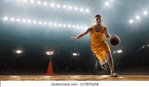 Basketball player dribbles