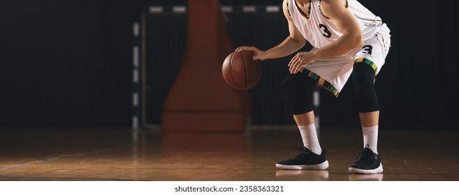 Basketball Player Dribbling A Ball. Basketball , Sport, Dribbling Basketball Player. Unrecognizable Basketball Player Dribbling - Powered by Shutterstock