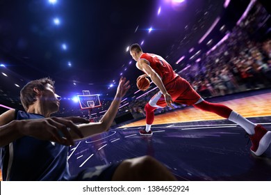 Basketball Player Make Block Shot In Jump. Around Arena With Blue Light Spot