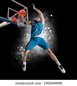 Basketball player players in action. Basketball concept on dark smoke background