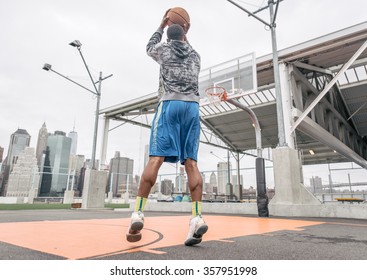 Basketball player playing on the court. Concept about sport and wellness - Powered by Shutterstock